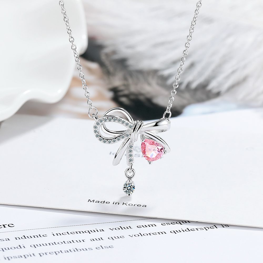 Silver Bow Pink Teardrop Necklace